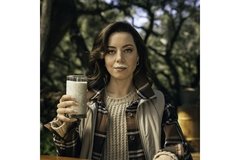 Image Aubrey Plaza drinking milk.